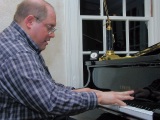 Dennis tearing up the piano again; external bounced flash [C-2020Z]